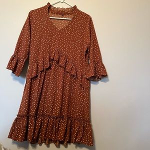 Rust polka dot dress. A line with small ruffles.